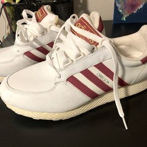Still brand new white and red Adidas. Size 9.5
